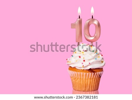 Birthday Cake With Candle Number 10 - On Pink Background. Royalty-Free Stock Photo #2367382181