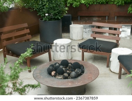 Social gathering area around the fire pit on the patio