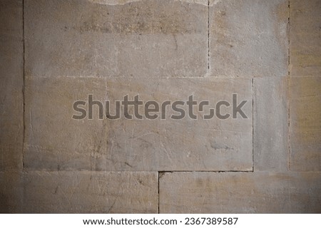 Large stone block wall of a historic or ancient nature