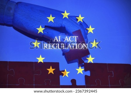 AI regulation symbol. Concept words AI artificial intelligence act regulation , robot hand on beautiful puzzle jigsaw. Business AI artificial intelligence regulation concept with the European flag . Royalty-Free Stock Photo #2367392445