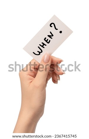 When text on a card in a woman hand isolated on a white background.
