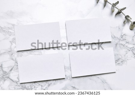 Modern business card mockup template with copy space. Design presentation layouts for corporate identity, advertising, personal, stationery on marble background. Concept of business, entrepreneurship.