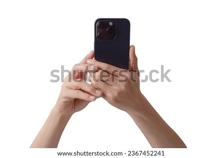 Female hand holding on mobile smartphone selfie ,show back side. Royalty-Free Stock Photo #2367452241