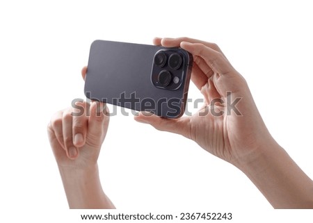 female teen hand taking photo with generic smartphone, isolated