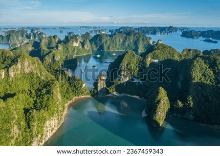 Aerial Ha Long Bay during daytime beautiful emerald green water. Southeast Asia nature background. Royalty-Free Stock Photo #2367459343
