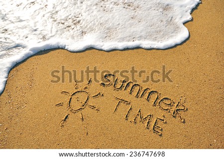 Summer Time message written in the sand on a beautiful beach, capturing the essence of a sunny and relaxing seaside vacation Royalty-Free Stock Photo #236747698
