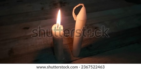 Pair of Candles in Subtle Glow