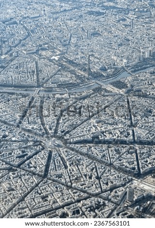 View of the Eiffel Tower and the Arc de Triomphe, symbols of the city of Paris and France