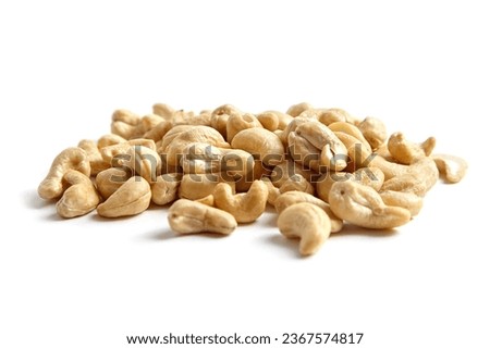 Cashew nut heap isolated on white background. White background, nutty delights. Royalty-Free Stock Photo #2367574817