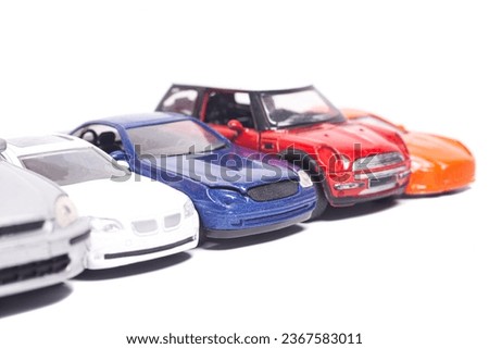 parking toy cars in a row isolated on white background