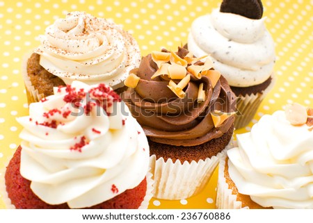 Some cupcakes on vintage background