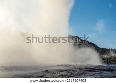 Strokkur, a fountain-type geyser located in a geothermal area beside the Hvítá River, southwestern Iceland, east of Reykjavík. It typically erupts every 6–10 minutes. Part of The Golden Circle Tour. Royalty-Free Stock Photo #2367609405