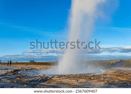 Strokkur, a fountain-type geyser located in a geothermal area beside the Hvítá River, southwestern Iceland, east of Reykjavík. It typically erupts every 6–10 minutes. Part of The Golden Circle Tour. Royalty-Free Stock Photo #2367609407