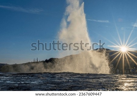 Strokkur, a fountain-type geyser located in a geothermal area beside the Hvítá River, southwestern Iceland, east of Reykjavík. It typically erupts every 6–10 minutes. Part of The Golden Circle Tour. Royalty-Free Stock Photo #2367609447