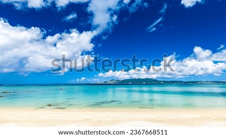 Beautiful view of blue sea or ocean by the white beach in summer, Okinawa in Japan, Nobody, Landscape or travel Royalty-Free Stock Photo #2367668511