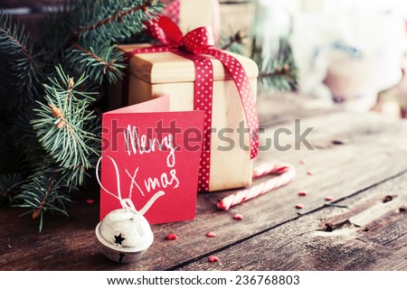 Christmas present on dark wooden background in vintage style  Royalty-Free Stock Photo #236768803