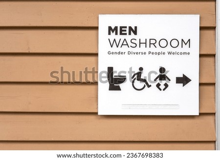 Men washroom sign on the brown wall. Gender diverse people welcome