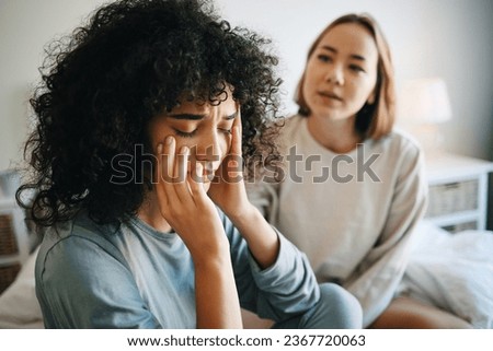 Lgbtq, woman and depression for couple fight in bedroom of home with conflict, crisis or problem relationship. Lesbian, partner and girl on bed with stress, anxiety and sad for argument and divorce Royalty-Free Stock Photo #2367720063