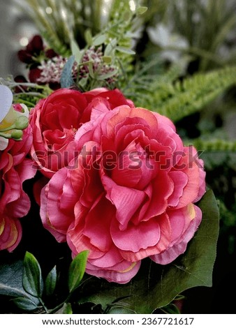 Artificial Red Rose flower makes colorful view from jeddah ksa