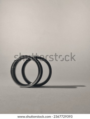 close-up of a pair of rings on a studio shot (isolated on white background)