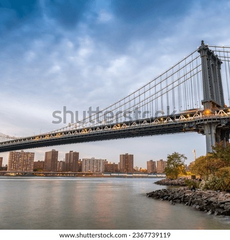 Manhattan Bridge at sunset in New York City, USA.