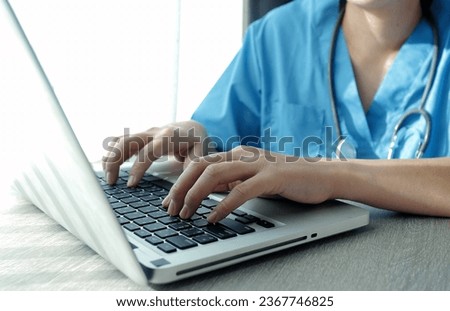Attractive female doctor make online video call consult patient on laptop. Medical assistant young woman therapist videoconferencing to web camera. Telemedicine concept. Online doctor appointment. Royalty-Free Stock Photo #2367746825
