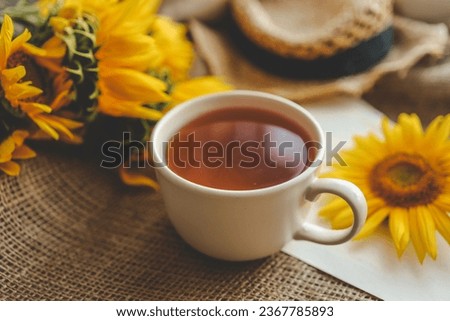 Cup of tea in the morning autumn atmosphere.