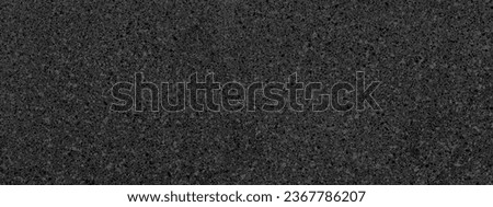 real black terrazzo marble pattern tile for interior flooring material. grey terrazzo chips on black background. matt rock flooring surface. black background with grey chips. Royalty-Free Stock Photo #2367786207