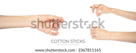 Cotton sticks in hands isolated on the white background. Cotton buds isolated. High quality photo Royalty-Free Stock Photo #2367811165