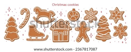 Set of gingerbread cookies. Christmas biscuits. Gingerbread man, home, snowflakes, and others. Xmas and New Year decor. Royalty-Free Stock Photo #2367817087