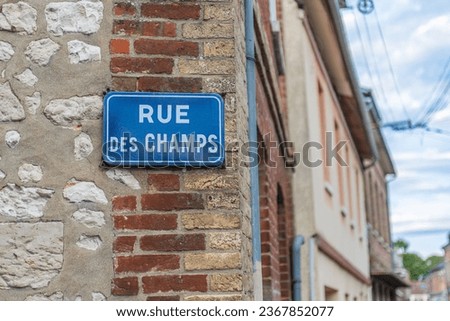 The Rue des champs ( Fields street) sign in the rural village of Le Vaudreuil, Normandy, France