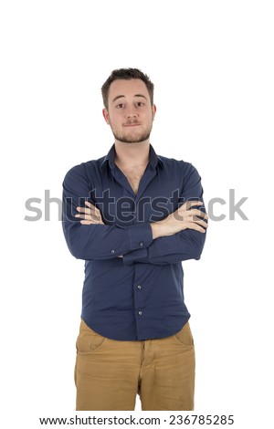 Young handsome man crossing his arms against a white background