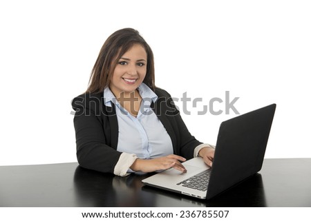 young business woman smiling with laptop against a white background