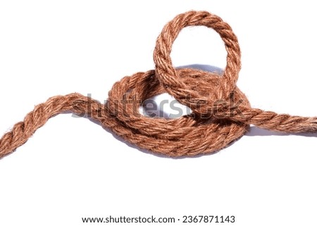 old rope made of twisted strands on a white isolated background
 Royalty-Free Stock Photo #2367871143