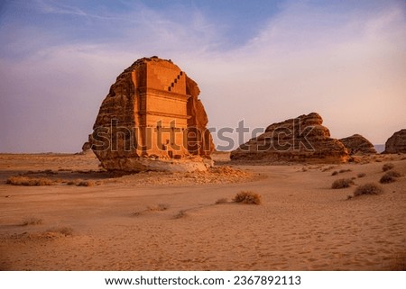 Visit the site of Hegra and explore over 110 astonishingly well-preserved tombs set in stunning desert landscape. You’ll also learn about the fascinating ancient people and culture of AlUla.  Royalty-Free Stock Photo #2367892113