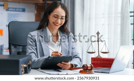 Pretty asian indian business woman as legal services across the board, legal consultant assisting clients with wide array of legal services and offerings, including appraisal and development support. Royalty-Free Stock Photo #2367930931