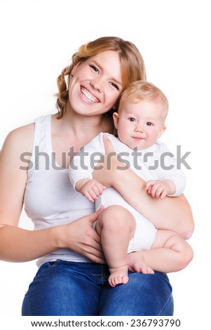 A happy family. young mother with baby. happy mother with baby isolated on white background. studio portrait.  picture of happy mother with baby over white. Mother holding sweet baby boy.