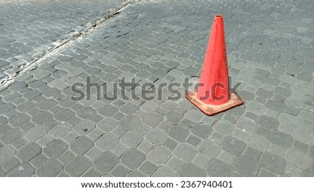 Traffic Cone on the road with negative space