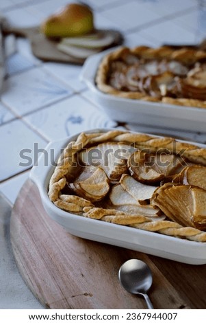 Pear pie. Charlotte of pears and shortcrust pastry. Rustic style. Vertical photo