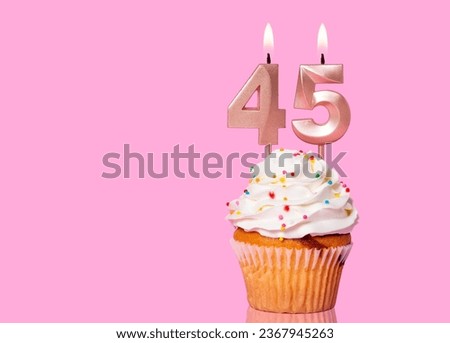 Birthday Cake With Candle Number 45 - On Pink Background.