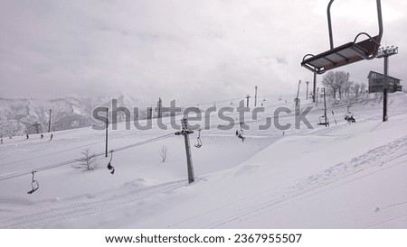 Japanese ski resort, beautiful snow scenery, next to the cable car.