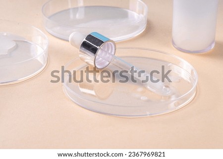 Ceramide barrier serum mockup. A bottle with ceramide or peptide milky white serum, with pipette for use. Cosmetics, skin care, anti-aging beauty care Royalty-Free Stock Photo #2367969821