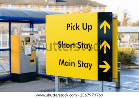 Sign to the pick up area, short stay and main stay car parks at Belfast International Airport