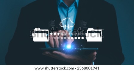 document file transfer. businessman working on a laptop using . data files between folders to documents. Digital system for transferring documents and files online.