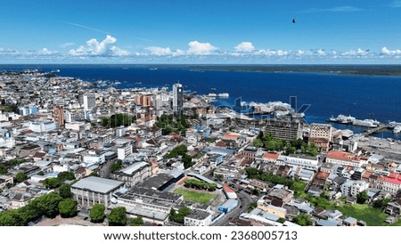 Downtown Manaus Brazil. Capital city of Amazonas State near Amazon river and Amazon forest. Tropical destination. Tropical travel. Tourism landmark. Outdoors urban scenery downtown Manaus Brazil.