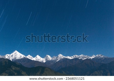 The beauty of the Panchachuli peak at night with the star trails 