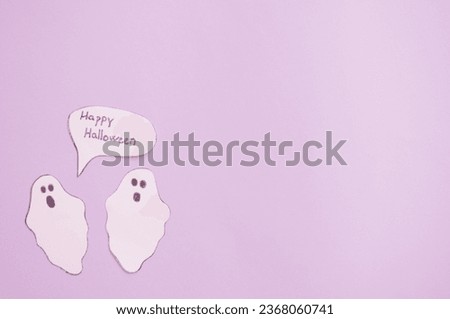 purple Halloween background with two ghosts  