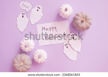 purple Halloween background - ghosts with pumpkins 