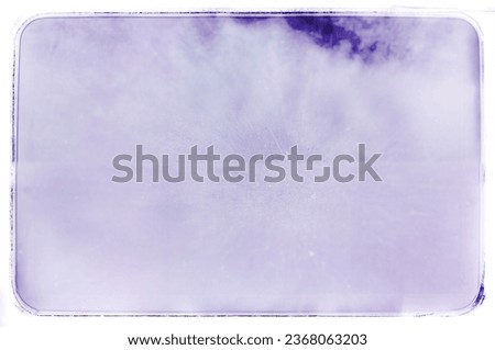 Explore our captivating abstract photograph featuring a pristine white paper texture adorned with delicate blue residue, evoking nostalgia and creativity. Ideal for stock agencies seeking unique.