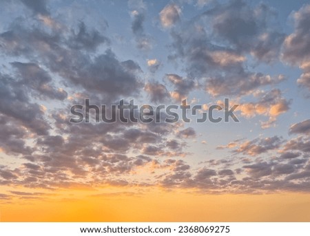 Golden hour sky with clouds. Ideal for sky replacement in modern photo editing software tools.